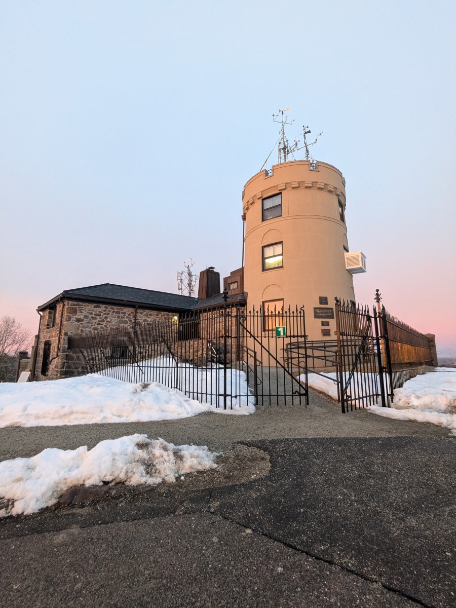 Blue Hill Observatory in winter after snowfall, at dawn