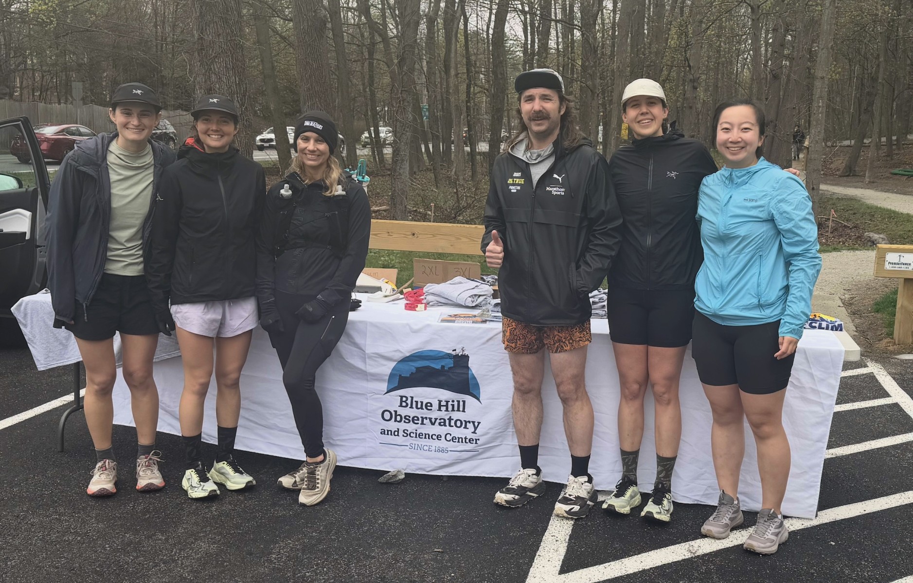 Climbers ascending Great Blue Hill on Earth Day 2026